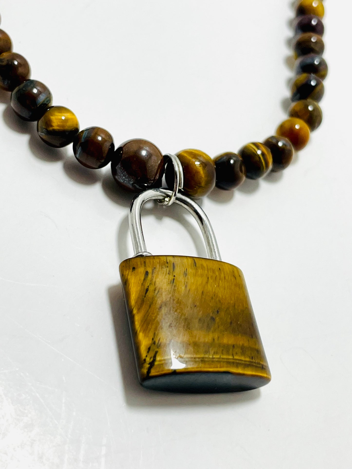 🔒🐯 Fierce Focus Padlock Choker – 17” Tiger’s Eye & Stainless Steel Power Necklace