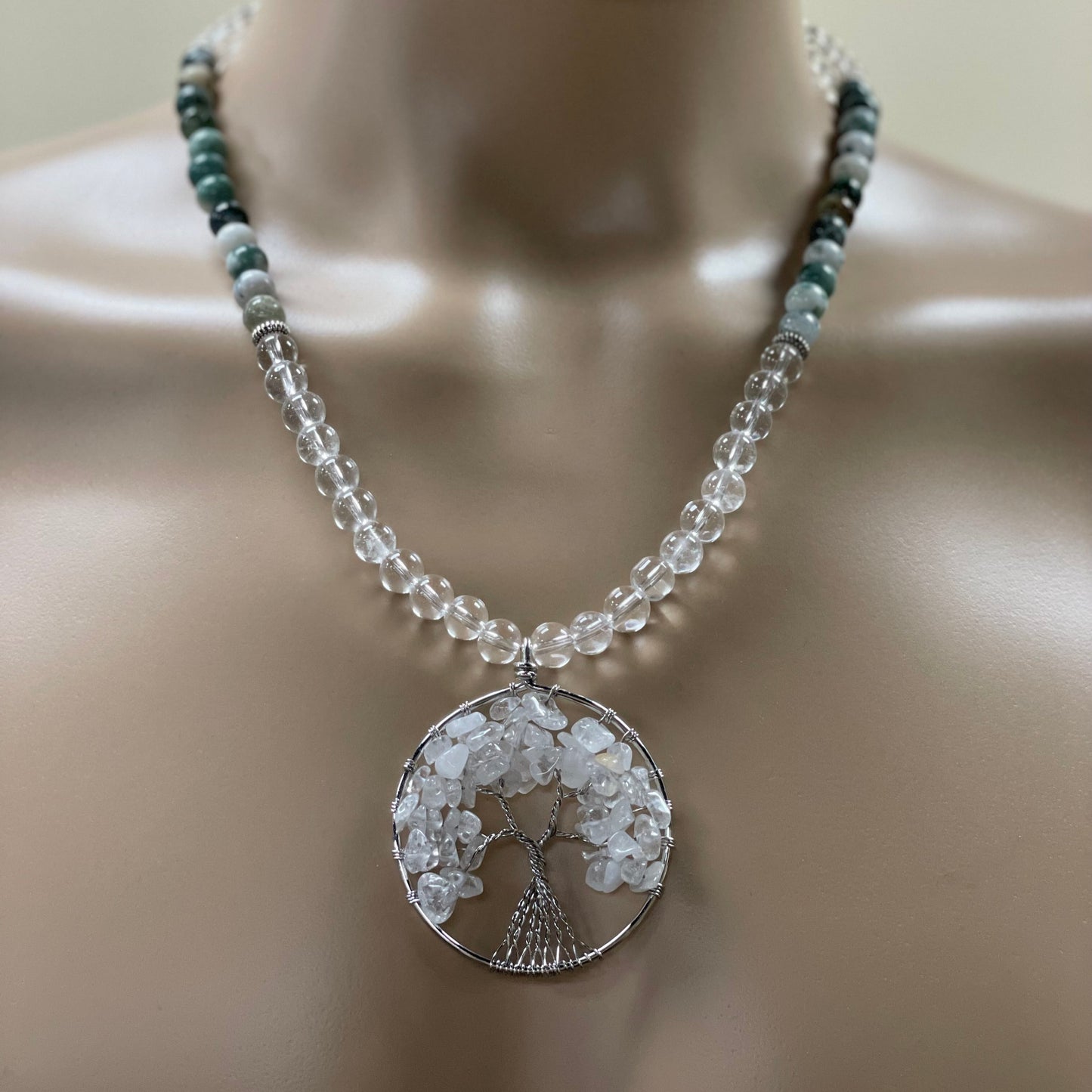 23” Wire Wrapped Stainless Steele Clear Quartz Tree of Life Necklace Adorned With 8mm Clear Quartz, Green Moss Agate, & Stainless Steele Spacer Beads