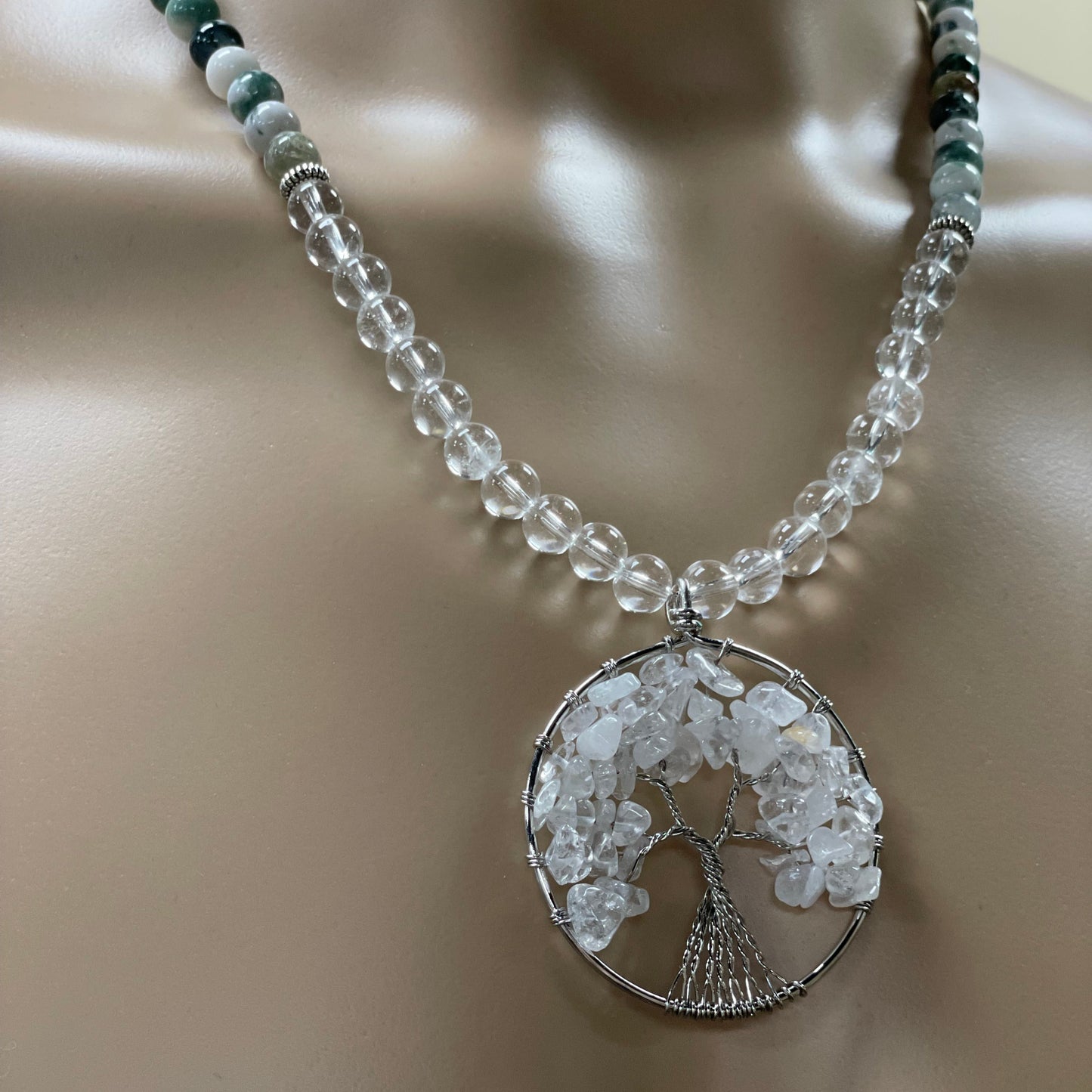 23” Wire Wrapped Stainless Steele Clear Quartz Tree of Life Necklace Adorned With 8mm Clear Quartz, Green Moss Agate, & Stainless Steele Spacer Beads