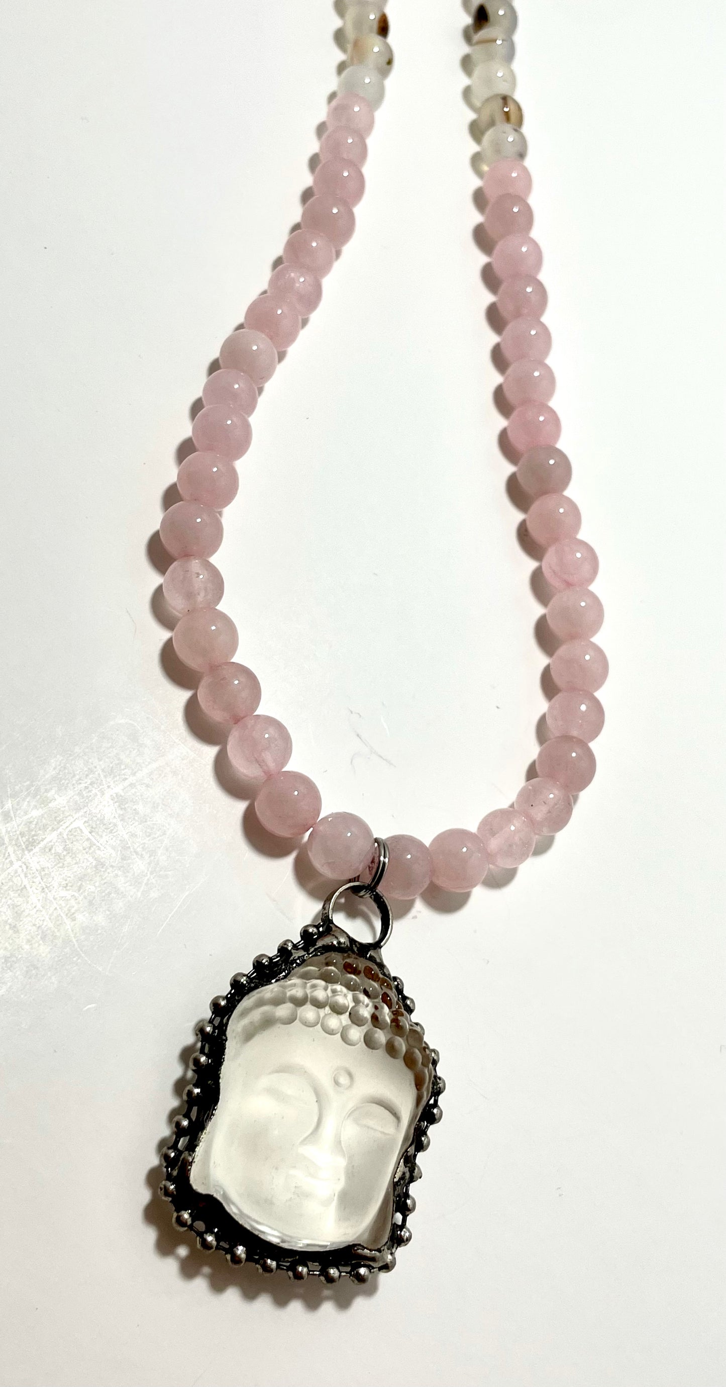 22.5” Stainless Steele Inlayed Hand Carved Clear Quartz Buddha Head Necklace Adorned With 8mm Rose Quartz & Flower Agate Beads