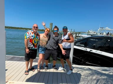 The whole Mad Mellow band together down at the Florida marina