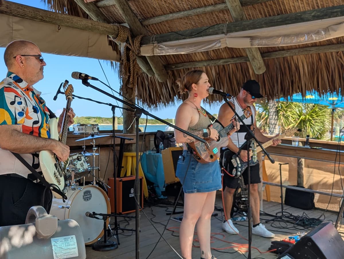 Mad Mellow playing live at a waterfront tiki bar in Florida