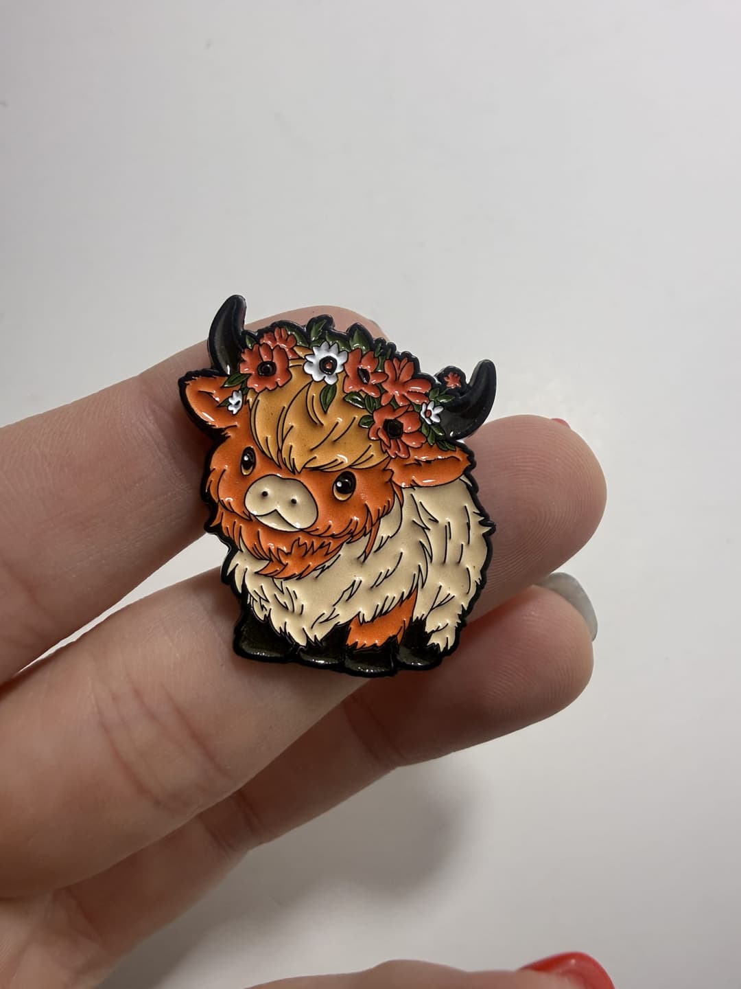 Highland Cow with Flower Crown Enamel Pin — photo 1