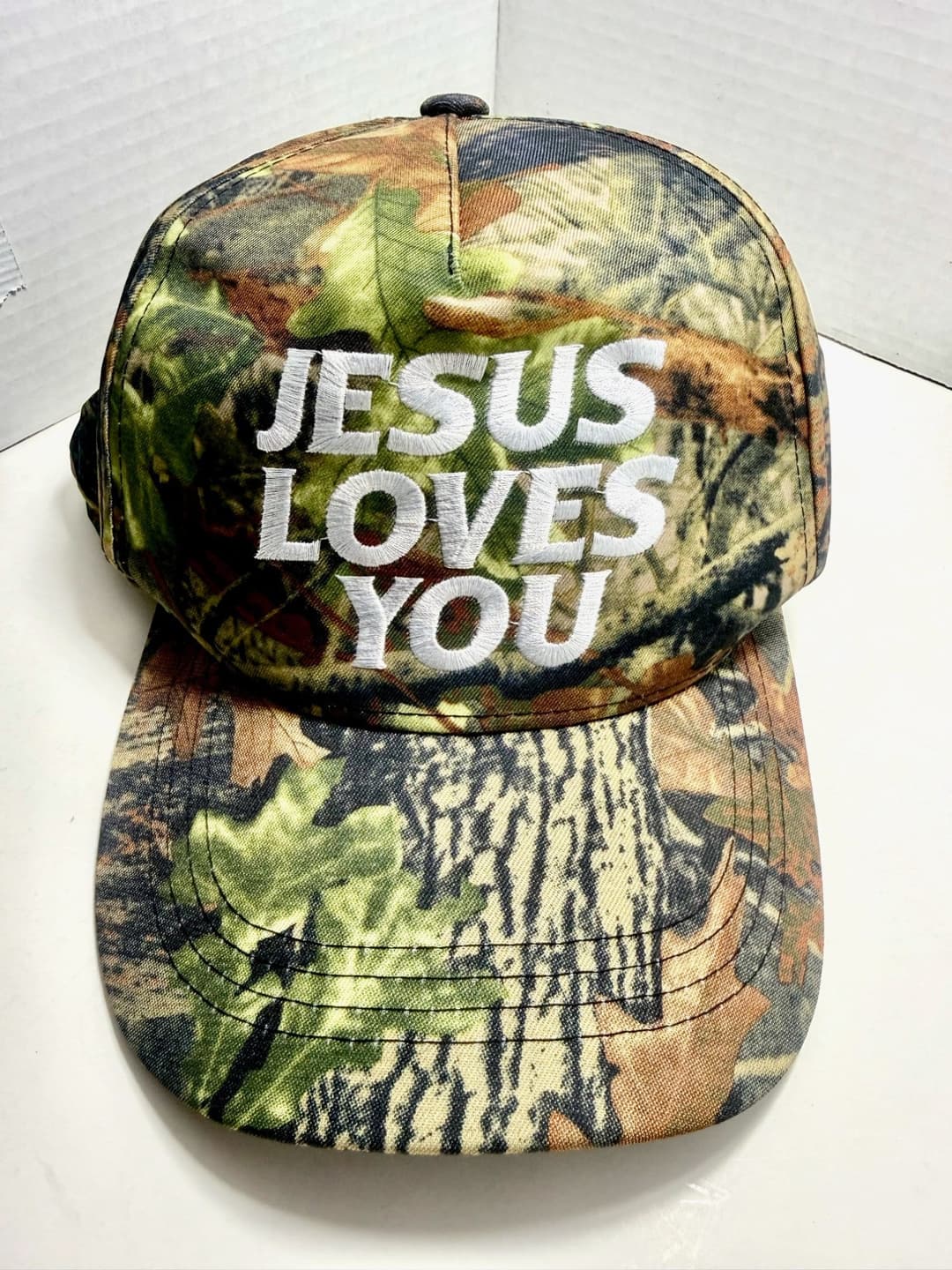 "Jesus Loves You" Camouflage Adjustable Trucker Hat — photo 1