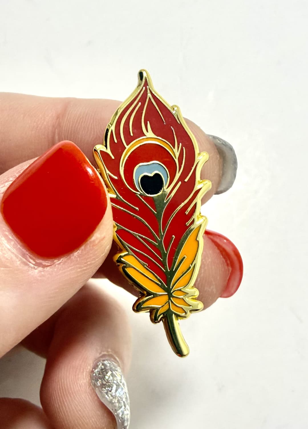 Phoenix Feather Enamel Pin — photo 1