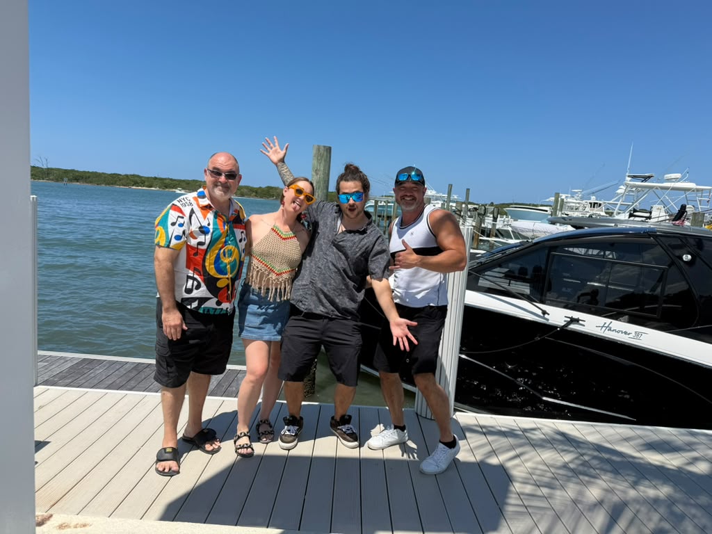 The whole Mad Mellow band together down at the Florida marina