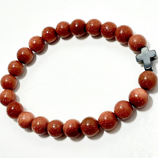 ✝️ Faithfully Rooted: 8mm Goldstone Bracelet with Hematite Cross