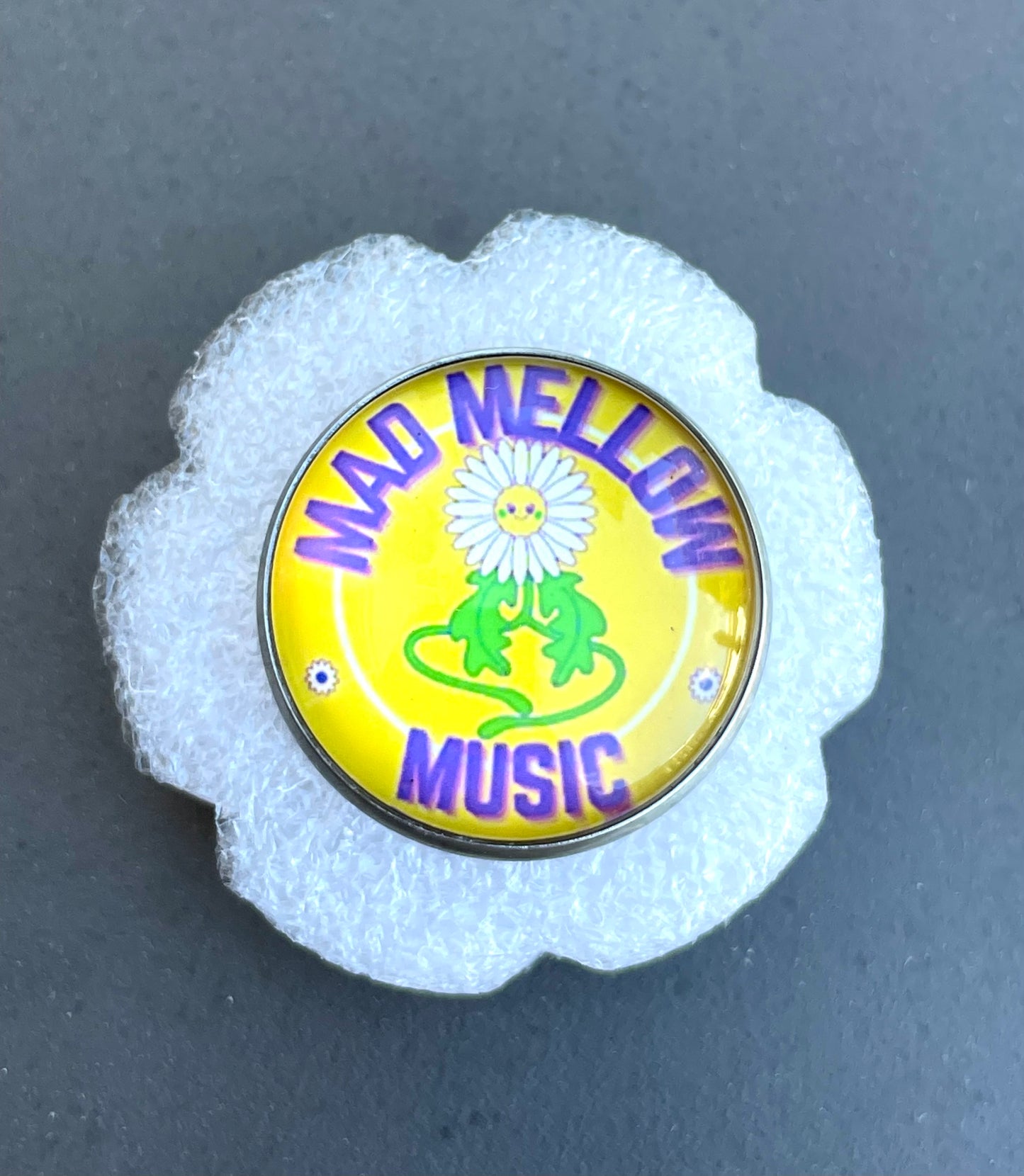 Mad Mellow Daisy Logo Pin – Official Band Merch Accessory