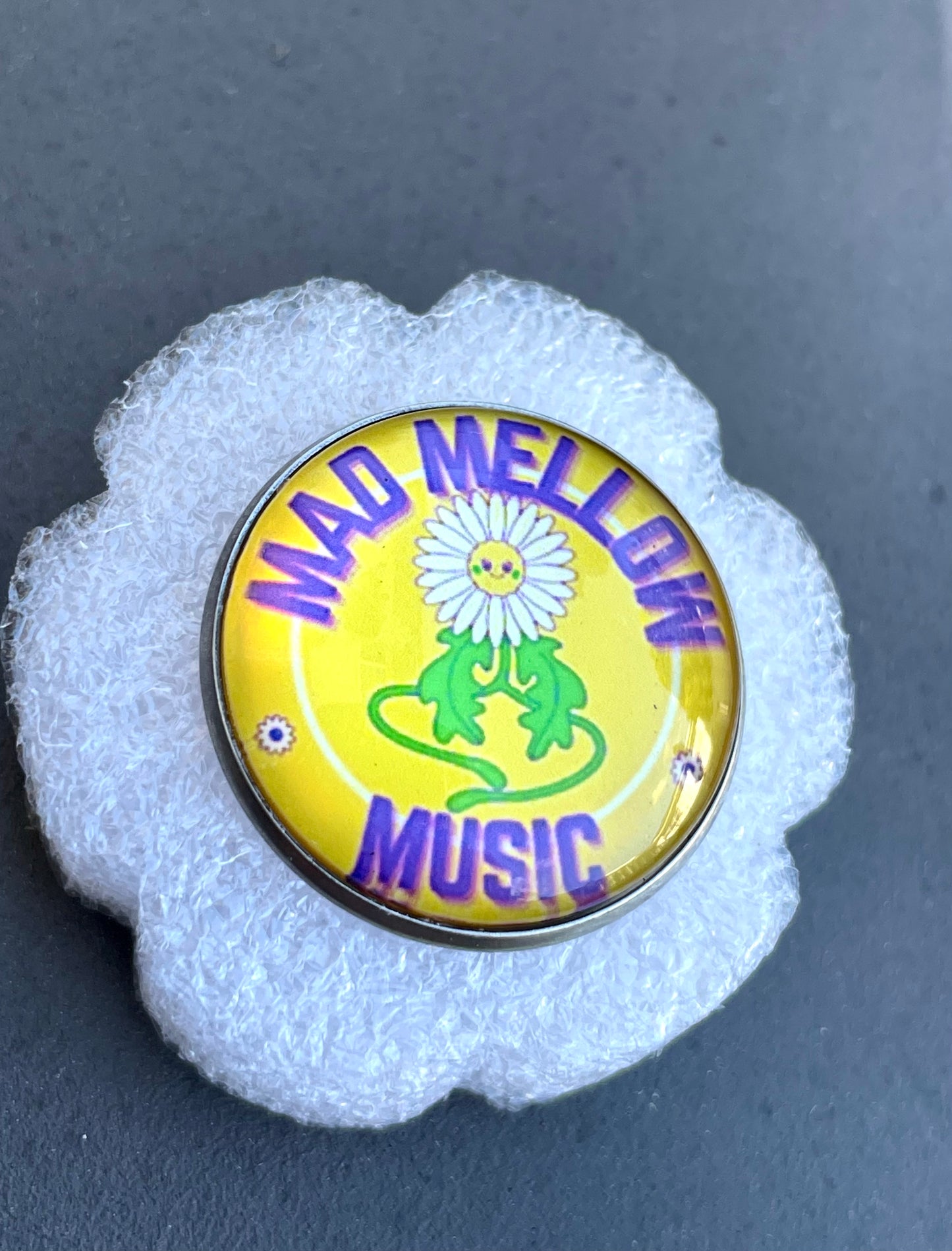 Mad Mellow Daisy Logo Pin – Official Band Merch Accessory