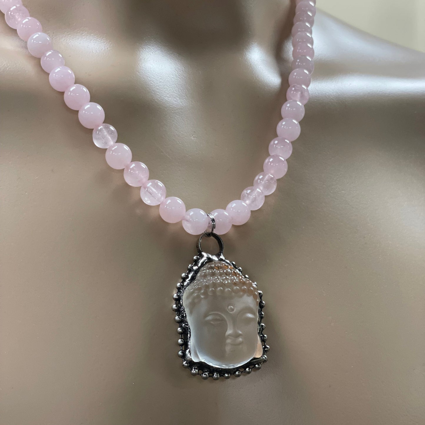 22.5” Stainless Steele Inlayed Hand Carved Clear Quartz Buddha Head Necklace Adorned With 8mm Rose Quartz & Flower Agate Beads