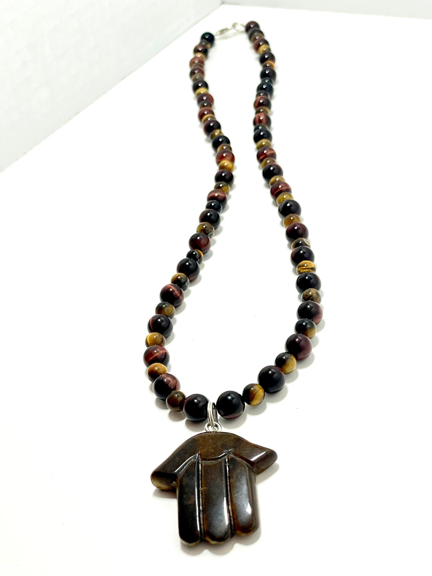 🧿✨ Tiger’s Eye Hamsa Necklace – 23” Hand-Carved with Red & Brown Tiger’s Eye Beads